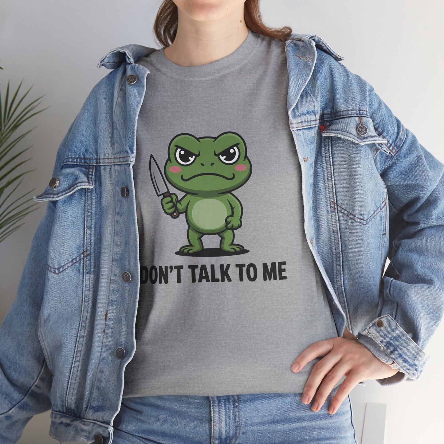 Model in blue denim jacket wearing grey Don’t Talk to Me frog meme shirt – casual novelty graphic tee.