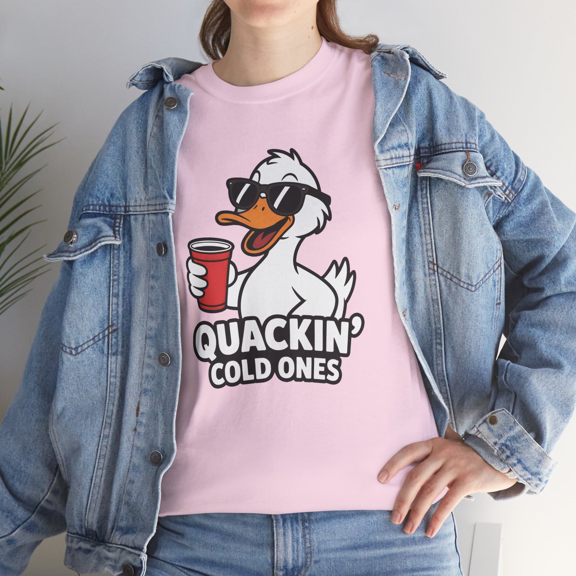 Model in blue denim jacket wearing pink Quackin’ Cold Ones duck meme shirt – casual fun meme outfit tee.