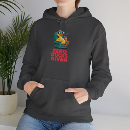 Model leaning against bench wearing dark grey Zero Ducks Given hoodie – casual funny gag gift sweatshirt